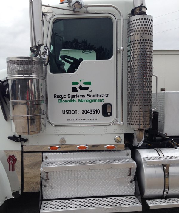 white truck cab with logo